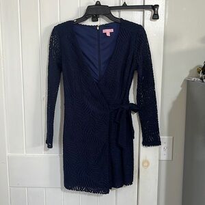 Lilly Pulitzer long sleeve crochet type romper. Navy blue tie front. Size xs.